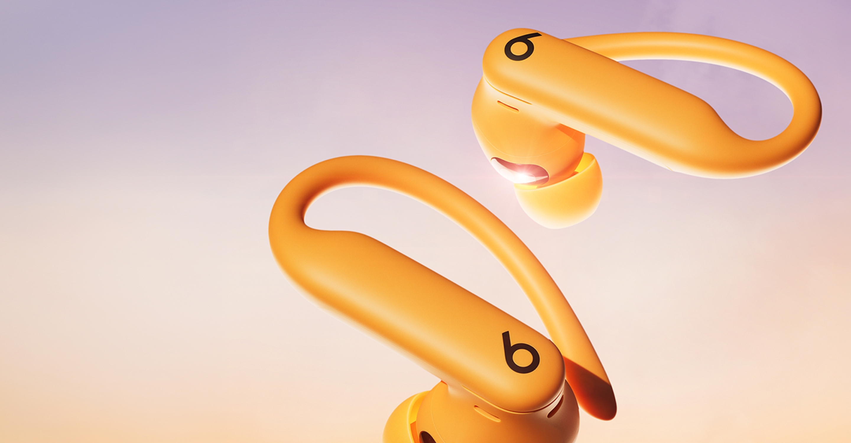 Powerbeats Pro 2 earbuds in Electric Orange