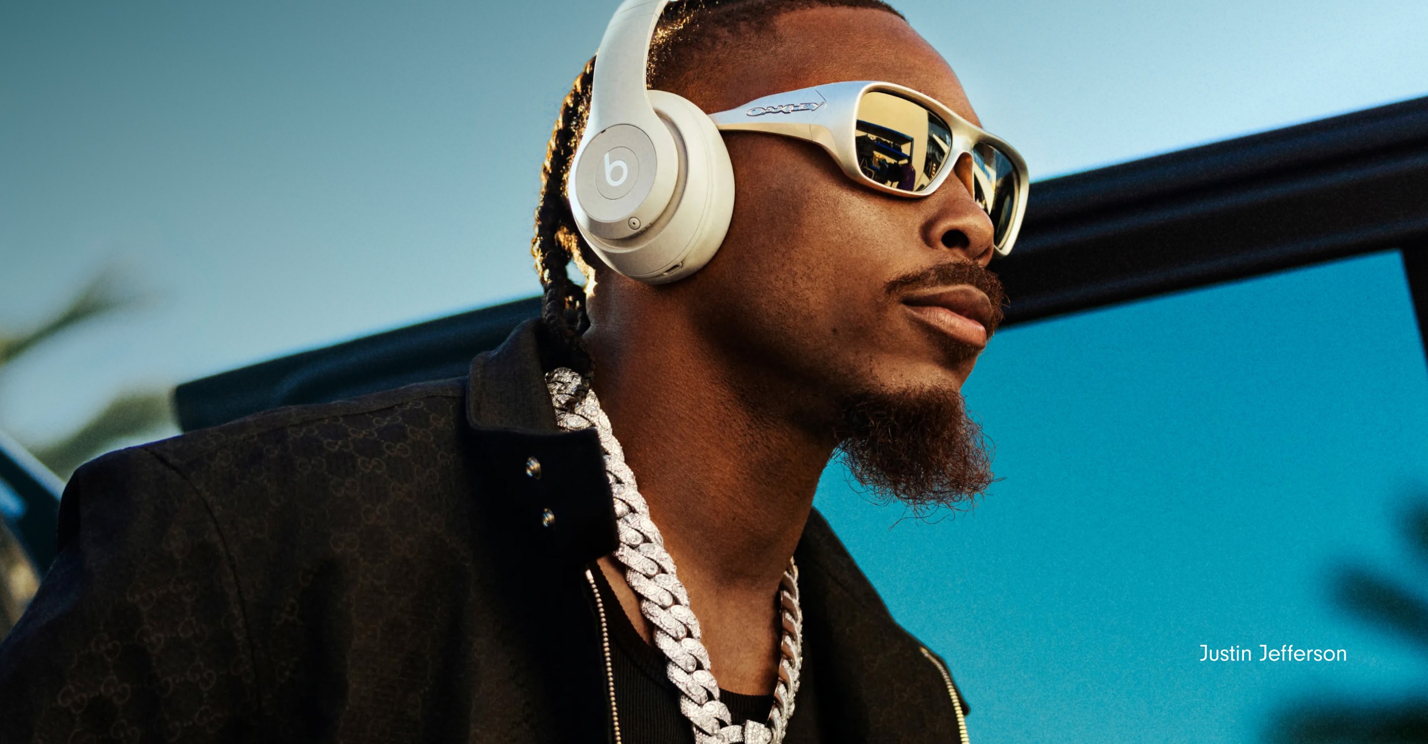 Athlete wearing Beats Studio Pro headphones in Sandstone